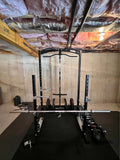 Heavy Duty Power Rack System for Strength Training – All-in-One Home Gym Equipment with Integrated Cable Pulley and Barbell.