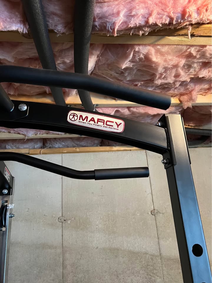 Heavy Duty Power Rack System for Strength Training – All-in-One Home Gym Equipment with Integrated Cable Pulley and Barbell.