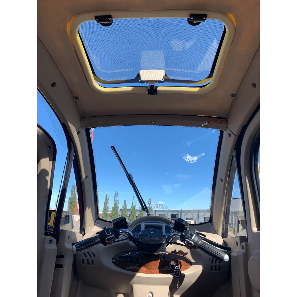 gio golf enclosed mobility scooter 60v 1200w, top speed 18mph, range up to 30 miles, backup camera, heater, fan, alarm, media center, 500lb load capacity